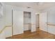 Bedroom with double door closet and hardwood floors at 5011 Chancellor Ne St, St Petersburg, FL 33703