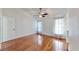 Spacious bedroom with wood floors and ceiling fan at 6207 Frost Dr, Tampa, FL 33625