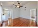 Bright bedroom with hardwood floors and access to bathroom at 6207 Frost Dr, Tampa, FL 33625