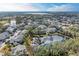 Aerial view of a tranquil community with a lake and lush greenery at 6303 Green Oak Cir, Bradenton, FL 34203