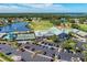 Community overview featuring clubhouse, pool, and tennis courts at 6303 Green Oak Cir, Bradenton, FL 34203