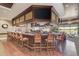 Large clubhouse bar with seating and a large TV at 6303 Green Oak Cir, Bradenton, FL 34203