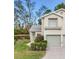 Two-story townhome with attached garage and manicured landscaping at 6303 Green Oak Cir, Bradenton, FL 34203