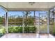 Spacious screened porch with pond view at 6303 Green Oak Cir, Bradenton, FL 34203