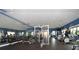 Well-equipped fitness center with cardio and weight machines at 6394 Roadstead Ct, Apollo Beach, FL 33572