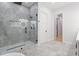 Spa-like bathroom with a large walk-in shower and modern fixtures at 716 S Lois Ave, Tampa, FL 33609