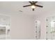 Bright bedroom with access to bathroom and hallway at 716 S Lois Ave, Tampa, FL 33609