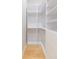 Spacious walk-in closet with ample shelving and hanging space at 716 S Lois Ave, Tampa, FL 33609