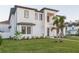 Two-story house with modern design and landscaping at 716 S Lois Ave, Tampa, FL 33609