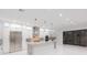 Modern kitchen with a large island and stainless steel appliances at 716 S Lois Ave, Tampa, FL 33609