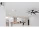 Open concept kitchen featuring a large island and modern pendant lighting at 716 S Lois Ave, Tampa, FL 33609