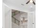 Open living room with a view of the kitchen and staircase at 716 S Lois Ave, Tampa, FL 33609