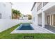 Virtual view of a refreshing pool in backyard at 716 S Lois Ave, Tampa, FL 33609