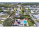 High-angle view of house, pool, and neighborhood at 7405 41St Ave N, St Petersburg, FL 33709