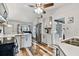 Bright kitchen with stainless steel appliances and wood-look flooring at 7405 41St Ave N, St Petersburg, FL 33709