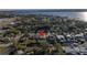 Aerial view of a home near waterway, neighborhood visible at 811 Camellia Ave, Ellenton, FL 34222