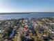 Aerial view of waterfront home with private dock and boat lift at 811 Camellia Ave, Ellenton, FL 34222
