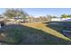 Large backyard with canal view and fence at 811 Camellia Ave, Ellenton, FL 34222