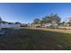 Large backyard with canal access, perfect for boating at 811 Camellia Ave, Ellenton, FL 34222