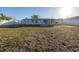 Large backyard with view of the house at 811 Camellia Ave, Ellenton, FL 34222