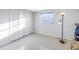Spacious bedroom with double doors and a window at 811 Camellia Ave, Ellenton, FL 34222