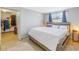 Spacious bedroom with a large bed and a walk-in closet at 811 Camellia Ave, Ellenton, FL 34222
