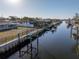 Private dock and lift along the waterfront canal at 811 Camellia Ave, Ellenton, FL 34222