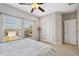 Spacious bedroom with large windows and ample closet space at 8442 Lagerfeld Dr, Land O Lakes, FL 34637