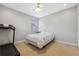 Bright bedroom with a treadmill and neutral walls at 8442 Lagerfeld Dr, Land O Lakes, FL 34637