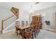 Traditional dining room with a large wooden table and hutch at 8442 Lagerfeld Dr, Land O Lakes, FL 34637