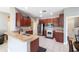 Modern kitchen featuring stainless steel appliances and ample cabinetry at 8442 Lagerfeld Dr, Land O Lakes, FL 34637