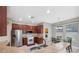 Bright kitchen with stainless steel appliances and an island at 8442 Lagerfeld Dr, Land O Lakes, FL 34637