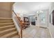 Elegant staircase leading to the upper level of the home at 8442 Lagerfeld Dr, Land O Lakes, FL 34637