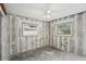 Under construction bedroom with exposed framing at 956 Bruce Ave, Clearwater Beach, FL 33767