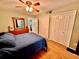 Comfortable bedroom with large closet and hardwood floors at 2043 Denmark St # 57, Clearwater, FL 33763