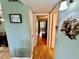 Bright hallway with access to bedrooms and living areas at 2043 Denmark St # 57, Clearwater, FL 33763