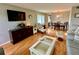 Living room with hardwood floors, a TV, and comfortable seating at 2043 Denmark St # 57, Clearwater, FL 33763