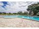 Relaxing kidney-shaped pool with patio at 2043 Denmark St # 57, Clearwater, FL 33763