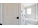 Bathroom with shower, white vanity, and a bathtub at 112 W Stanley St, Tampa, FL 33604