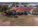 House with large backyard and surrounding neighborhood at 1207 Bluewater Dr, Sun City Center, FL 33573