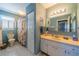 Bathroom with shower/tub combo and vanity at 1207 Bluewater Dr, Sun City Center, FL 33573