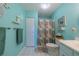 Bathroom with shower and updated vanity at 1207 Bluewater Dr, Sun City Center, FL 33573