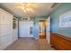 Bedroom with access to bathroom and closet at 1207 Bluewater Dr, Sun City Center, FL 33573