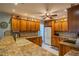Bright kitchen with wood cabinets and granite countertops at 1207 Bluewater Dr, Sun City Center, FL 33573