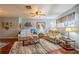 Relaxing living room with hardwood floors and light walls at 1207 Bluewater Dr, Sun City Center, FL 33573