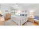 Bright bedroom with double bed and ample closet space at 12200 Vonn Rd # 1106, Largo, FL 33774