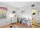 Bright bedroom with wood floors, dresser, and a desk at 12200 Vonn Rd # 1106, Largo, FL 33774