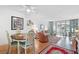 Bright dining area with table and chairs at 12200 Vonn Rd # 1106, Largo, FL 33774