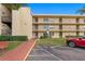 Condo building with ample parking and accessible entrance at 12200 Vonn Rd # 1106, Largo, FL 33774