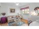 Cozy living room with floral couch and coffee table at 12200 Vonn Rd # 1106, Largo, FL 33774